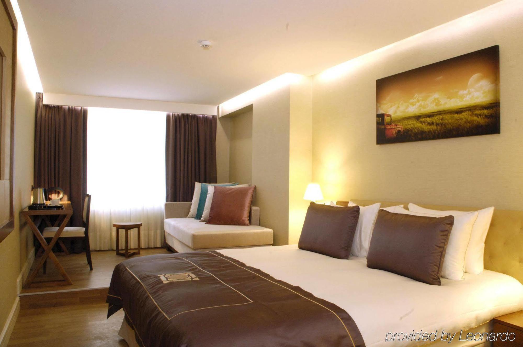 Taba Luxury Suites And Hotel Стамбул Номер фото